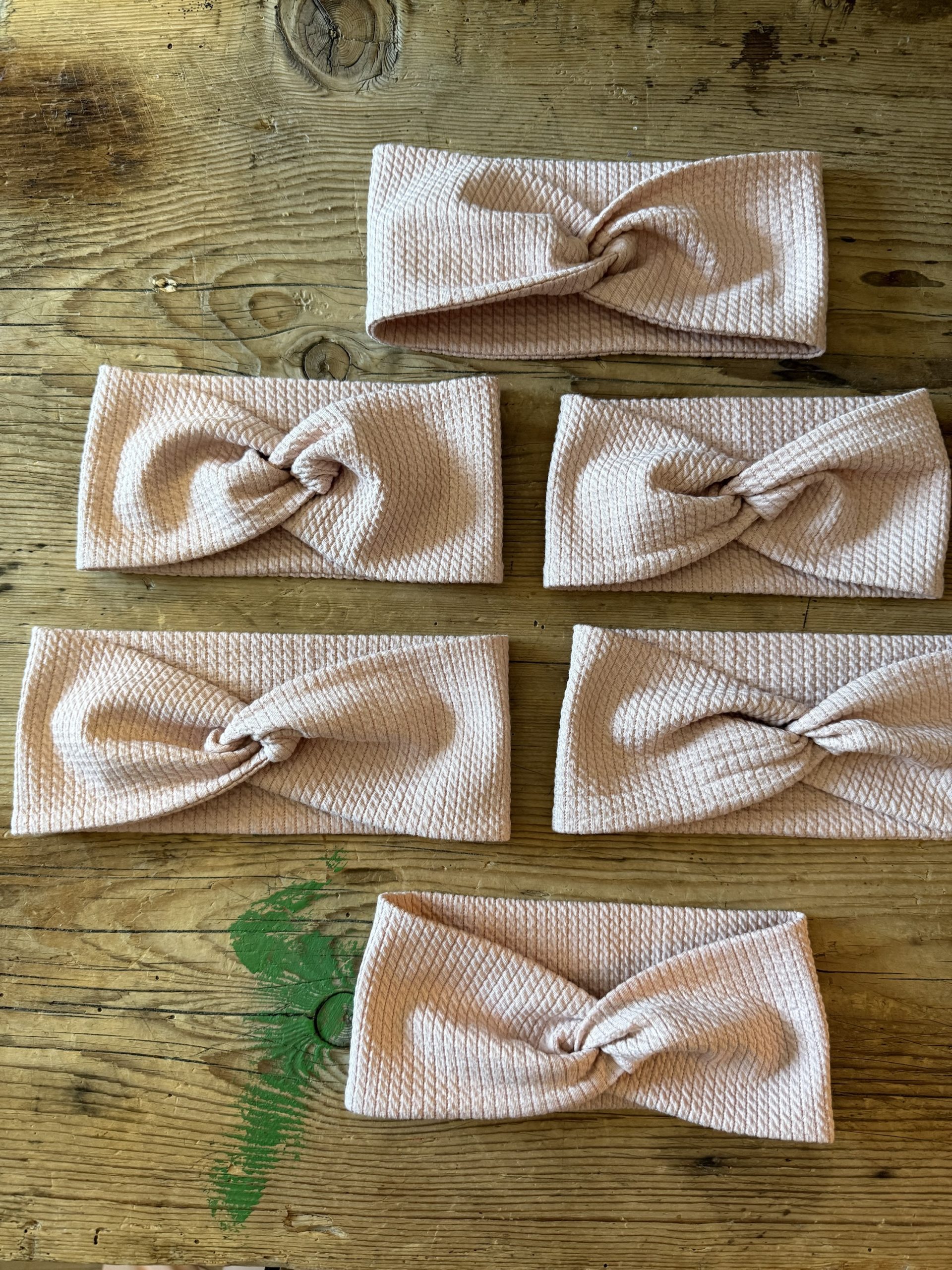 Knotenstirnband "Zopfstrick" rosa